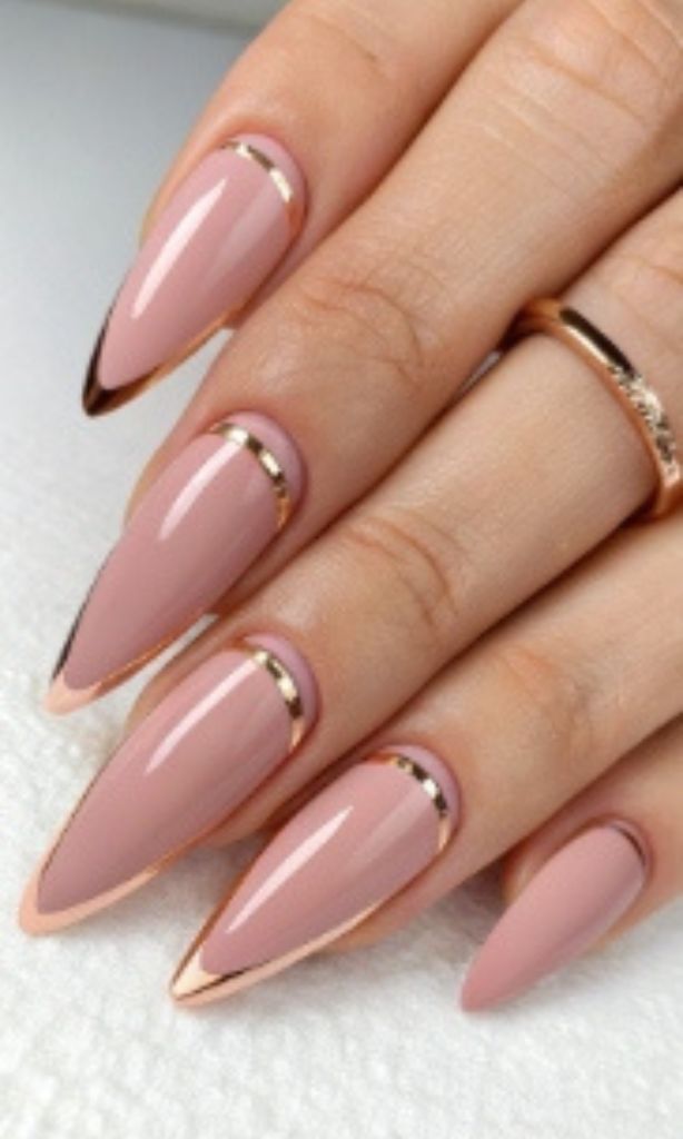 It is image on Dusty Rose Gold Chrome Rhinestone Nails.