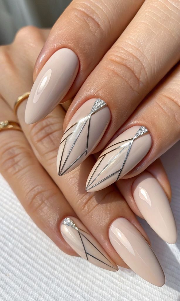 It is image on Silver Geometric Leaf Crystal Nails.