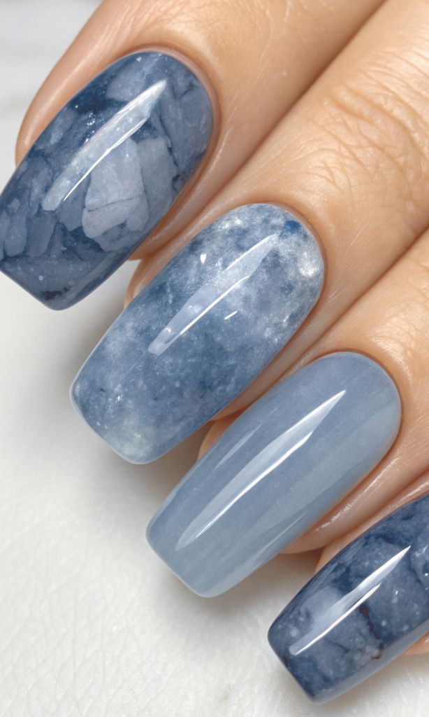 It is image on Stormy Blue Marble Gel Nails.