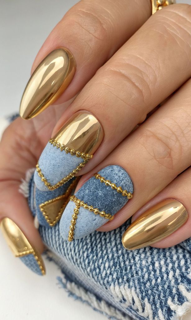 It is image on Gold Chrome Stiletto Nails With Denim Accent.
