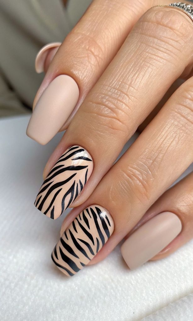 It is image on Minimalist Nude Black Zebra Nail Art.