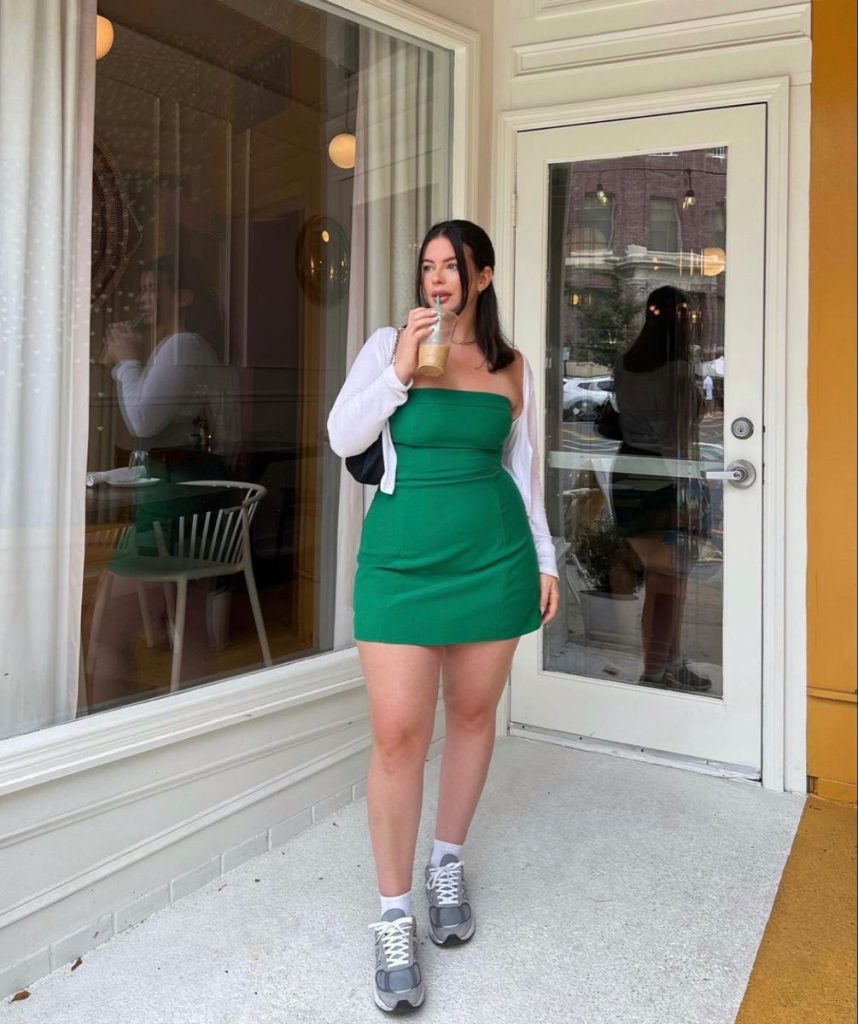  Green strapless mini dress with a white shirt and sneakers