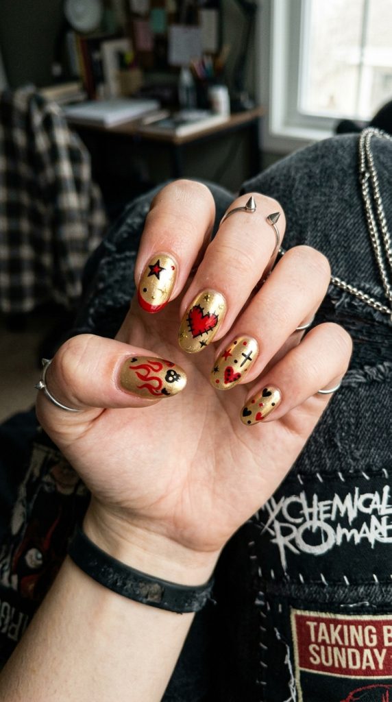 Y2K emo nails in black with red accents and hearts
