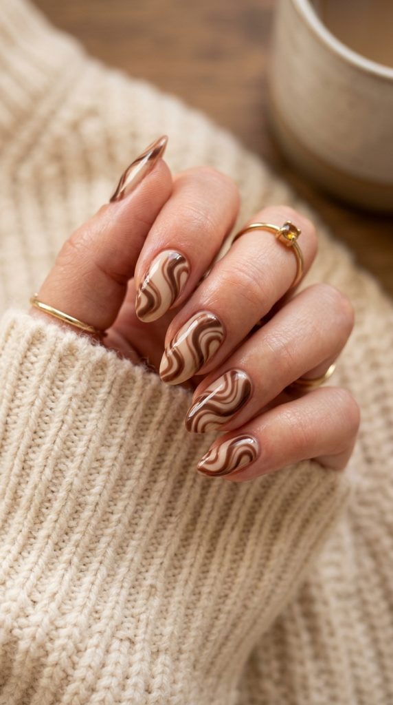 Chocolate brown and cream swirl nails