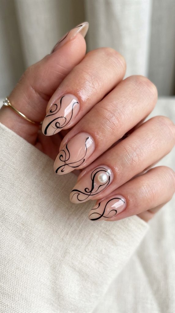 Black abstract swirls on a nude base