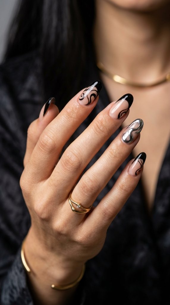 Black and chrome swirl nails