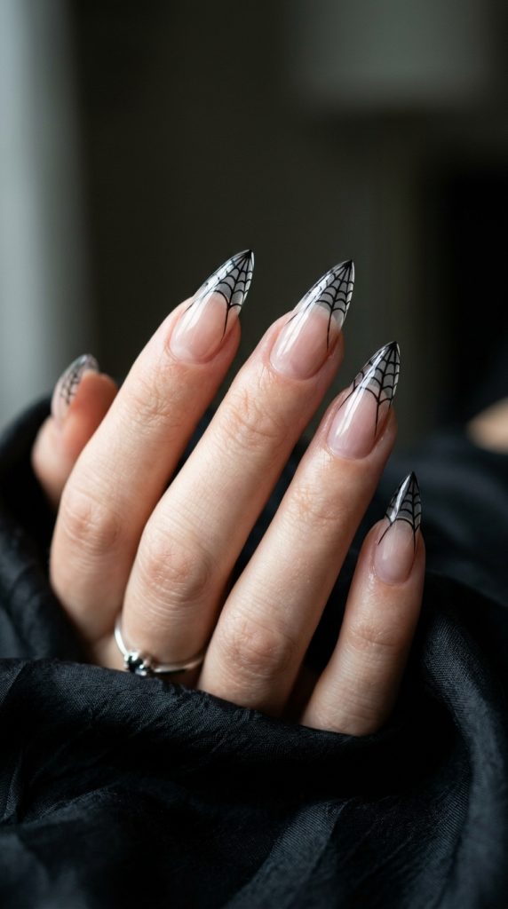 Black spider-web tip stiletto nails