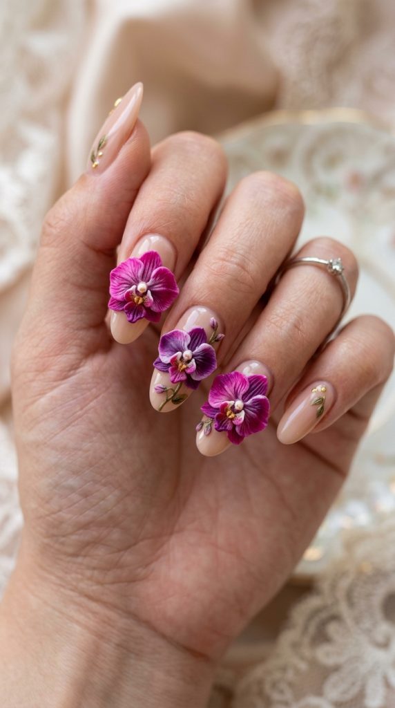 Bold fuchsia 3D orchid nails
