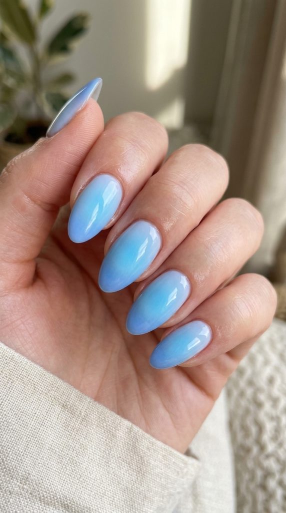 Tonal blue aura nails in shades of the same color