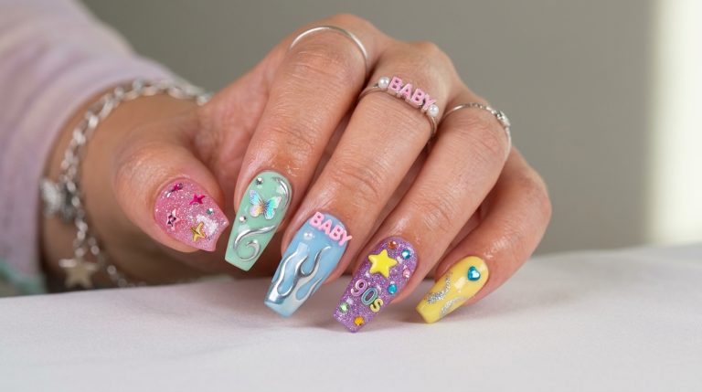 Bold Y2K nails with stars, charms, chrome, and rhinestones