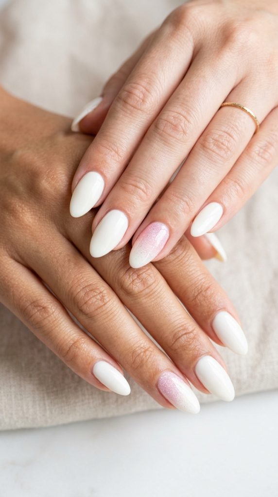 Fresh, clean cream-white dip nails with pristine, luminous finish