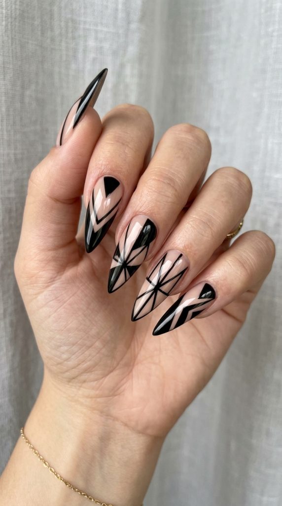 Black and nude negative space stiletto nails