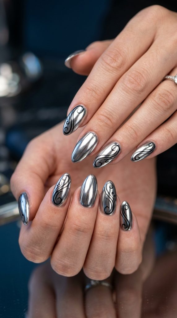 Futuristic mirror-finish chrome silver dip nails with reflective metallic effect