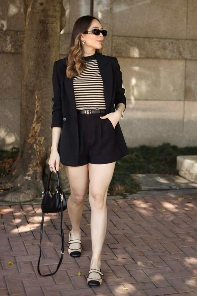 Striped top with black blazer and tailored black shorts
